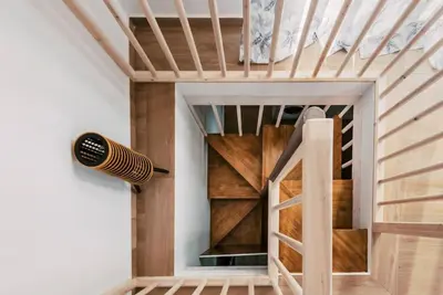 a room with a wooden closet with a door at Myrovolos luxury Eneida's house in Ialyssos