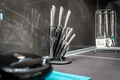 a group of utensils in a holder on a counter at Mayas House Greece Rhodes Kremasti in Kremasti