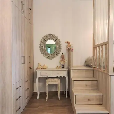 a bedroom with a dressing table and a mirror at Laurel LK Houses in Kritinia Rhodes in Kritinía