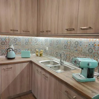 a kitchen counter with a mixer and a sink at Laurel LK Houses in Kritinia Rhodes in Kritinía