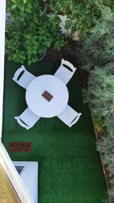 an overhead view of a table in a garden at MARY'S APARTMENT in Paradissi in Paradeísion