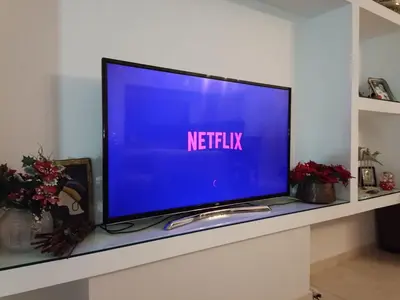 a flat screen tv sitting on a shelf at Irini's house afandou in Afantou