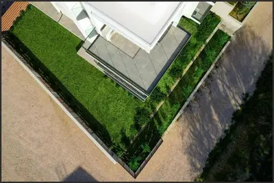 an overhead view of a yard with green grass at Maison Du Jardin 2-Bedroom Apartment Private Outdoor Jacuzzi in Rhodes Town