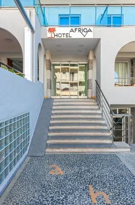a set of stairs leading to an office building at Hotel Africa in Rhodes Town