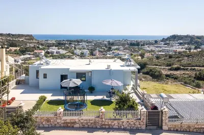 a villa with a view of the ocean at Sebastian Villas in Afantou