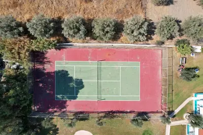 an overhead view of a tennis court at Lydia Maris Resort & Spa in Kolimbia