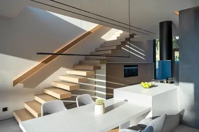 a dining room with a white table and stairs at Villa Casa Palmera in Ixia