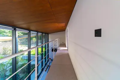 a staircase in a house with wood ceilings and windows at Villa Casa Palmera in Ixia