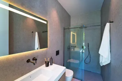 a bathroom with a sink and a shower at Villa Casa Palmera in Ixia