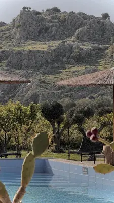 a view of a pool with a mountain in the background at LA Casa Di Lusso N3 - Adults Only in Kolimbia