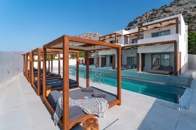 an image of a villa with a swimming pool at THERETRA PEFKI Seaside in Pefki Rhodes