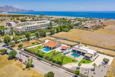 an aerial view of a resort near the ocean at Villa Kalathos by Villa Plus in Kalathos