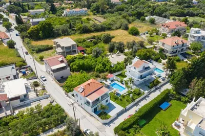 an aerial view of a city with houses at Villa Costa by Villa Plus in Ialyssos