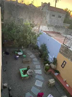 an aerial view of a garden with a building at VILLA VICTORIA OLD TOWN in Rhodes Town