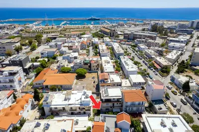 an aerial view of a city with the ocean at Eddy's Apartment in Rhodes Town