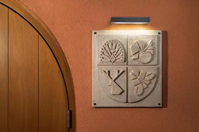 a light on a wall with a design on it at Rhodes Island View in Ixia