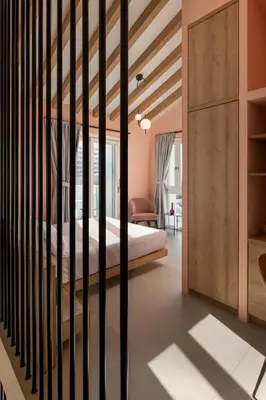 a bedroom with a bed with a wooden crib at Rhodes Island View in Ixia