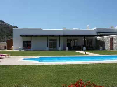 a house with a swimming pool in the yard at Villa Olympos Ladiko in Kalithies
