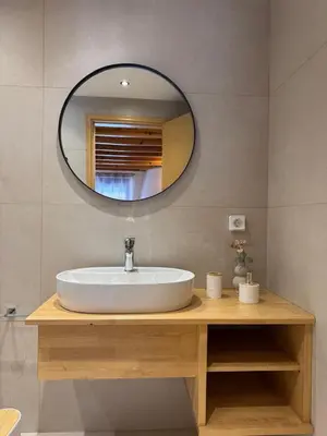 a bathroom with a sink and a mirror at Aleyna house Lindos area in Líndos