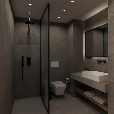 a bathroom with a sink and a toilet and a mirror at Island Sea Side Hotel - Adults Only in Rhodes Town