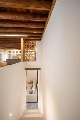a view of a living room from the hallway of a house at Pera houses 2-bedroom in the center of Lindos in Líndos