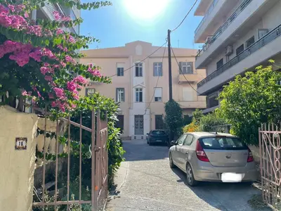 a car parked in front of a building at Niochori Heritage: The Mermaid Suite in Rhodes Town