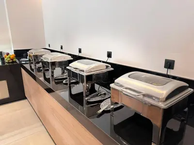 a row of mattresses lined up in a waiting room at Angela Downtown Hotel in Rhodes Town