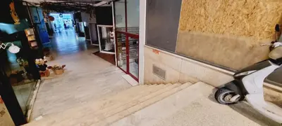 a view of a hallway of a building with a motorcycle at Danae Luxury Apartment - Rhodes in Rhodes Town