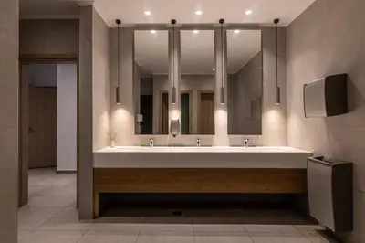 a bathroom with a sink and a large mirror at Eden Roc Resort - All Inclusive in Kallithea Rhodes
