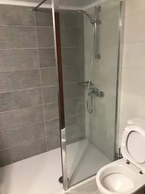 a shower stall with a toilet in a bathroom at Jacob Apartments in Center of Rhodes in Rhodes Town