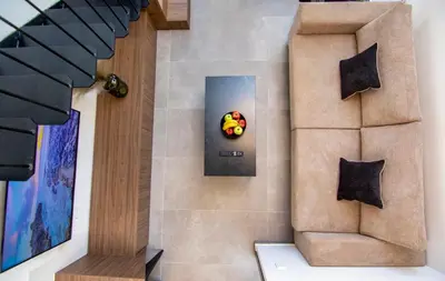 a staircase with a painting of apples on the wall at Luxury Loft in the center in Rhodes Town