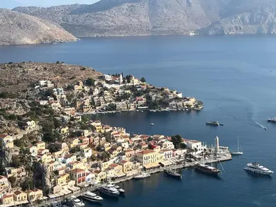 an aerial view of a town on an island in the water at Aleminas Rooms 1 in Symi