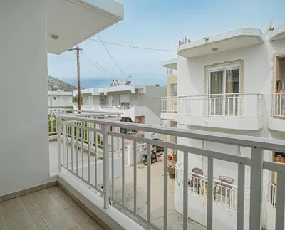 a view from the balcony of a house at Basiliki's Apartments in Archangelos