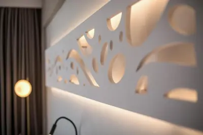 a room with a wall with lights on it at Anemone Premium Suites Faliraki in Faliraki