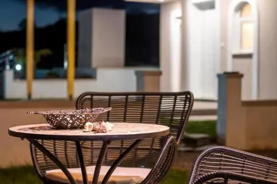 a table with a bowl on top of it at Villa Regina - Luxury and Comfort in Lachania