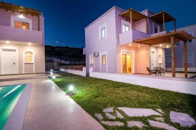 a large house with a yard with a swimming pool at Regina Villa - Family Dream with double pool in Lachania
