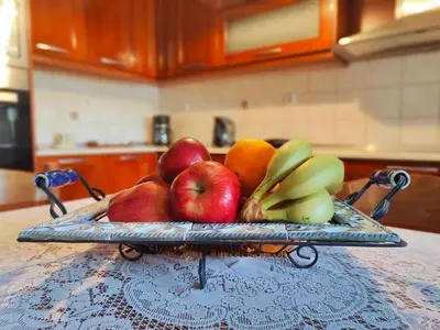 a tray of fruit on a table in a kitchen at Evaggelia's Private House in Fanes Rhodes in Phanaes