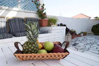 a basket of fruit sitting on a table at Evaggelia's Private House in Fanes Rhodes in Phanaes