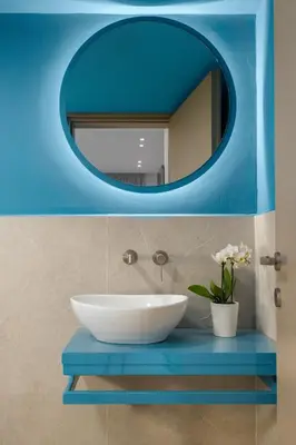 a bathroom with a sink and a mirror at Stylish Rhodes Apartment with Prime Location - L & C City Escape in Rhodes Town