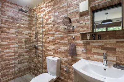 a bathroom with a toilet and a sink at Parko Studios in Rhodes Town