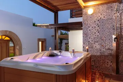 a bathroom with a large tub in a room at LindosaquaView Luxury villa in Líndos
