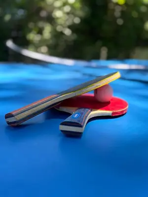 a pair of tongs on top of a blue car at Katerlove Beach House in Faliraki