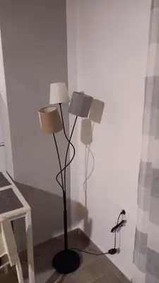 two lamps in the corner of a room at CASA DI'ELEN in Faliraki