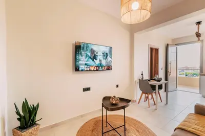 a living room with a couch and a table at Seascape House in Kremasti