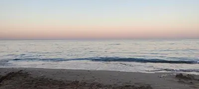 a view of the ocean from the beach at el greco apartment in Rhodes Town