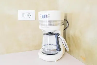 a white blender sitting on top of a counter at LA CASA DI MARCONI in Symi