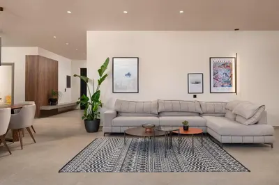 a living room with a couch and a table at Mirena Luxury Living-Casa Di Ria in Afantou