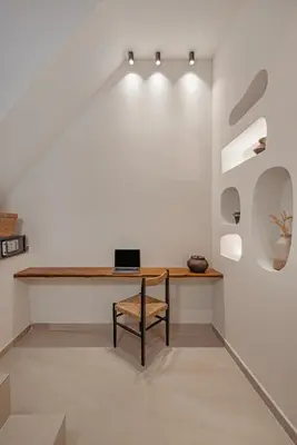 a room with a desk with a laptop on it at Noema Lindos - Athena Apartment in Líndos