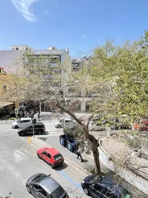 a group of cars parked in a parking lot at Rhodes Central: King Bed Studio in Rhodes Town