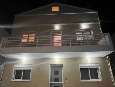 a view of the top of a house at night at Lydia's cozy house in Paradeísion